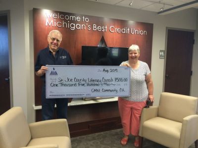 Omni Credit Union gives a Grant to the Literacy Council